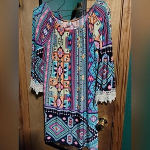 Off the shoulder boho dress with lace detailing on the end of the sleeves